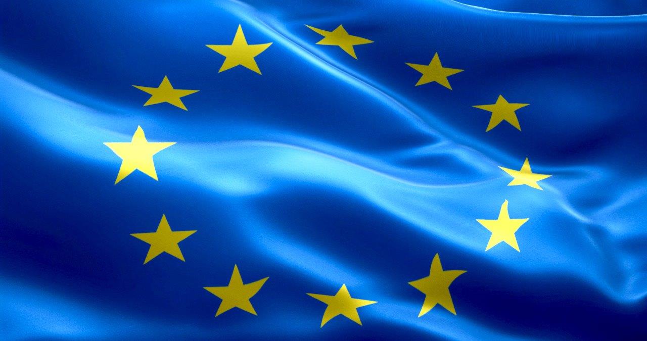 The image features the flag of the European Union, which consists of a blue field adorned with a circle of twelve golden stars, symbolizing unity and harmony among European nations.