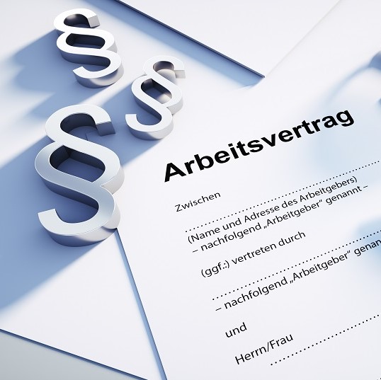 The image shows a legal document titled "Arbeitsvertrag" (employment contract) with blank spaces for names and addresses. Surrounding the document are stylized paragraph symbols, indicating legal content. The document appears to emphasize formal agreements related to employment.