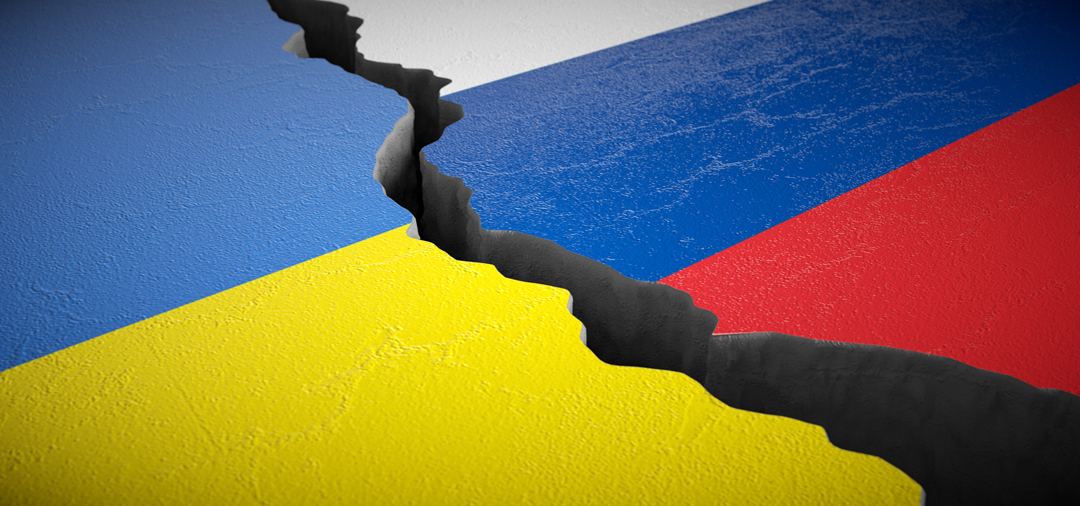 A split image features the blue and yellow colors of the Ukrainian flag on one side, and the blue, white, and red colors of the Russian flag on the other. A large crack separates the two sections, symbolizing division or conflict between Ukraine and Russia.