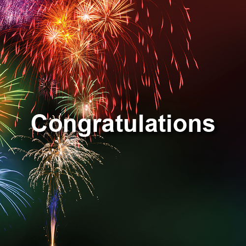 Colorful fireworks burst against a dark background, with the word "Congratulations" prominently displayed in white text. The scene conveys a festive and celebratory atmosphere, perfect for marking achievements or special occasions.