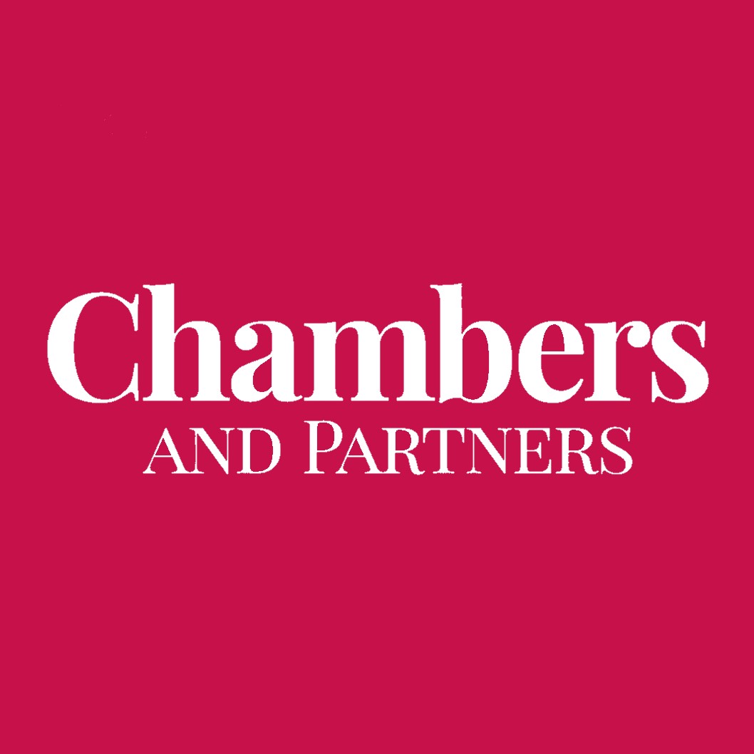 Logo of Chambers and Partners featuring the text "Chambers" in large white font, above the words "AND PARTNERS," also in white but smaller. The background is a solid deep red color.