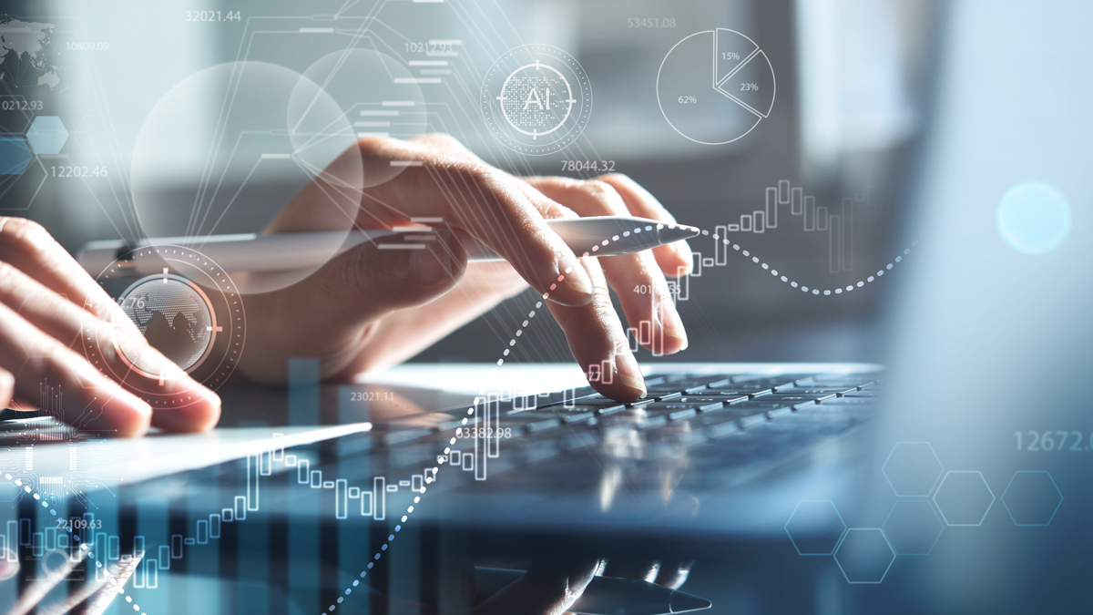 A close-up of a person's hands typing on a laptop keyboard. Digital graphs, numbers, and technology-related icons overlay the image, suggesting data analysis or tech workflows. The setting appears modern and focused on productivity.