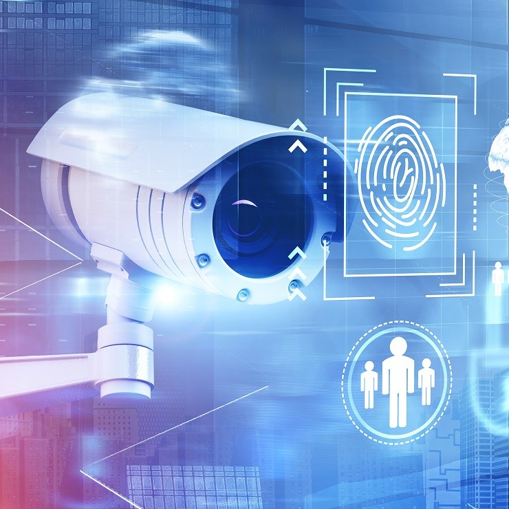 An illustration of a surveillance camera, symbolizing security and monitoring. Behind it, digital elements represent biometric identification, including a fingerprint and stylized human figures, suggesting a focus on advanced technology and identity verification in surveillance practices.